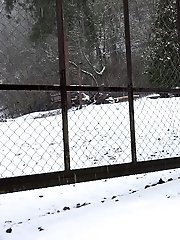 15 pictures - Brunette pissing outside in the snow for Got2Pee