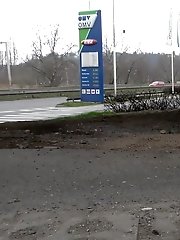 15 pictures - Petrol station pissing behind a big pillar