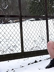 15 pictures - Brunette pissing outside in the snow for Got2Pee