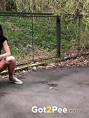 15 pictures - Gorgeous girl pees in the tennis courts