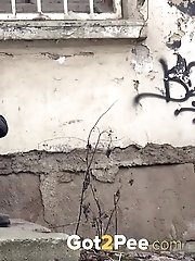 15 pictures - Pretty blonde girl is filmed peeing in public