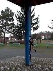 15 pictures - Naughty dark haired babe pees in a public park