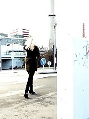 15 pictures - Cute blonde pees in the middle of the city