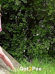 15 pictures - Public pissing for cute blonde European