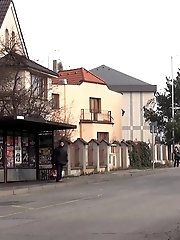 15 pictures - Sexy brunette babe pisses behind a bus stop