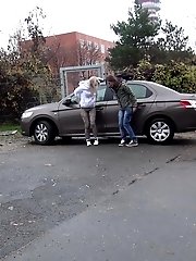 15 pictures - Two friends piss behind a parked car