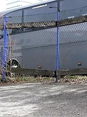 15 pictures - Dark haired girl pisses by a public car park