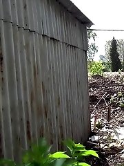 15 pictures - Cute brunette leaves a puddle of piss in the soil